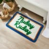 Nudey Rudey Slogan Bath Mat